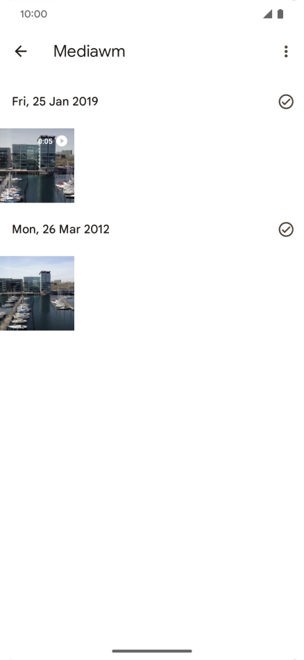 Press and hold any picture or video clip. Press and hold any picture or video clip.