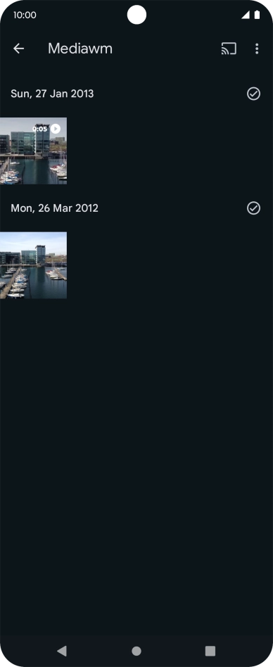 Press and hold any picture or video clip. Press and hold any picture or video clip.