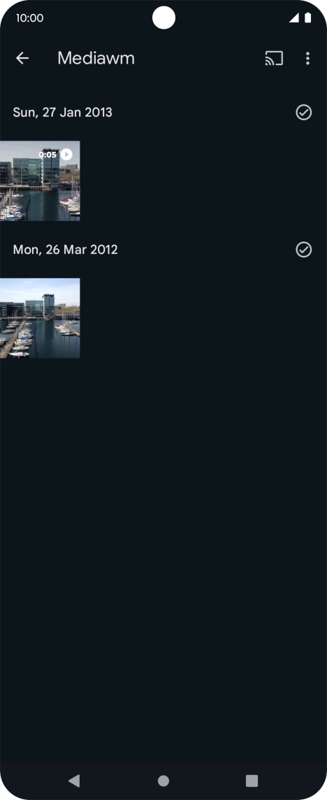 Press and hold any picture or video clip. Press and hold any picture or video clip.