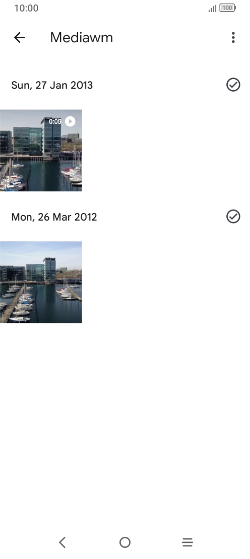 Press and hold any picture or video clip. Press and hold any picture or video clip.