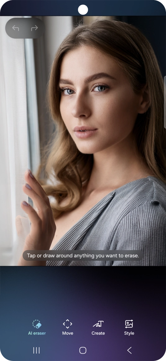 To remove objects from your picture, press AI eraser and follow the instructions on the screen to use the function. To remove objects from your picture, press AI eraser and follow the instructions on the screen to use the function.