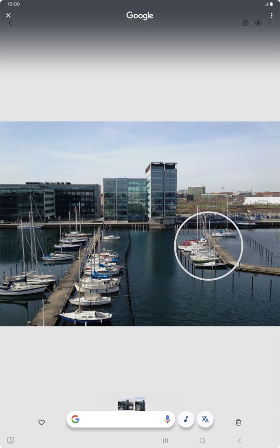 Draw a circle around the required object on the picture and wait for the search results. Draw a circle around the required object on the picture and wait for the search results.