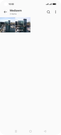 Press and hold any picture or video clip. Press and hold any picture or video clip.