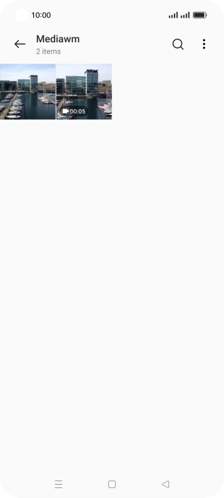 Press and hold any picture or video clip. Press and hold any picture or video clip.