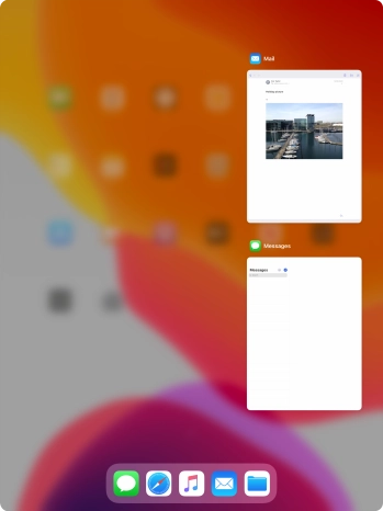 Slide upwards on the required application to end it. Slide upwards on the required application to end it.