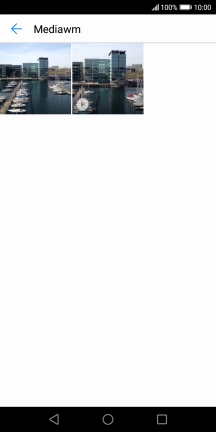 Press and hold the required picture or video clip. Press and hold the required picture or video clip.