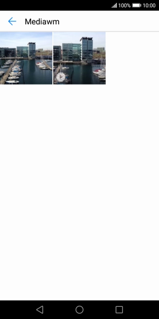 Press and hold the required picture or video clip. Press and hold the required picture or video clip.