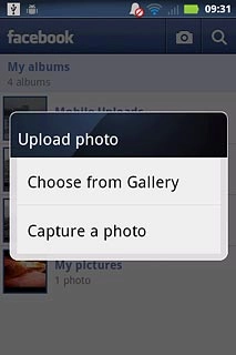 To upload a saved picture:Press Choose from Gallery.