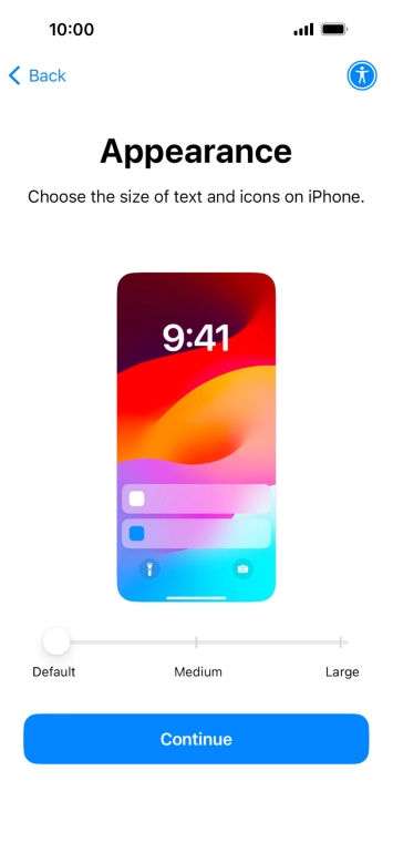 Select the required text and icon size on your phone and press Continue.