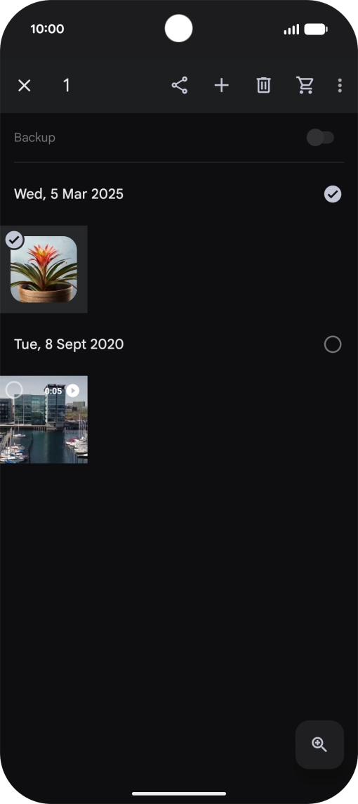 Press the required pictures or videos to select them.