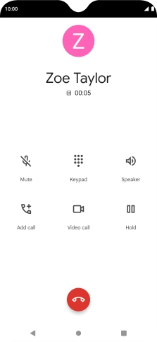 Press the end call icon.