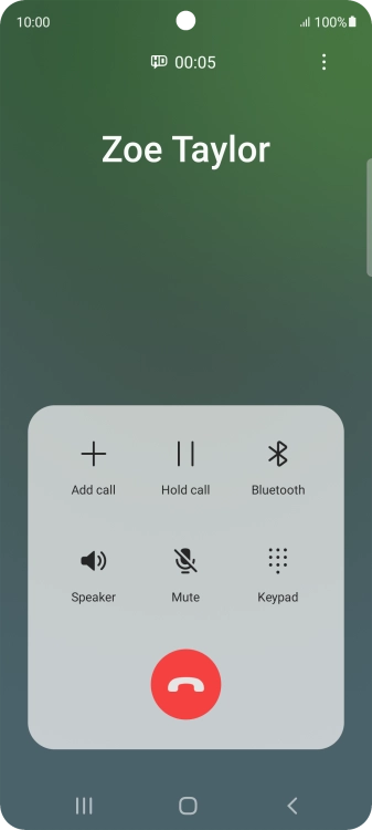 Press the end call icon.