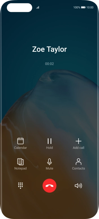 Press the end call icon.