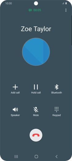 Press the end call icon.