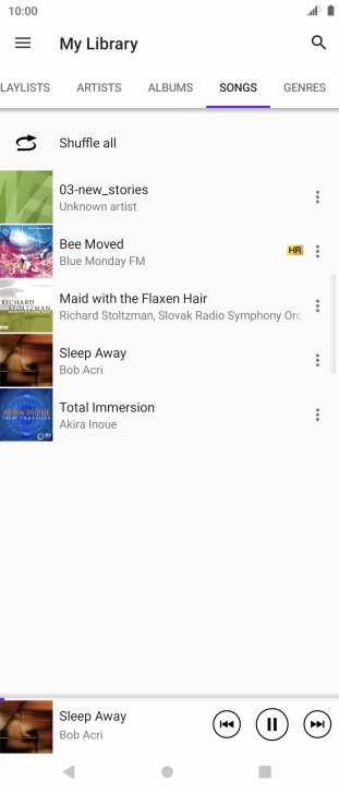 Press the song title at the bottom of the screen.