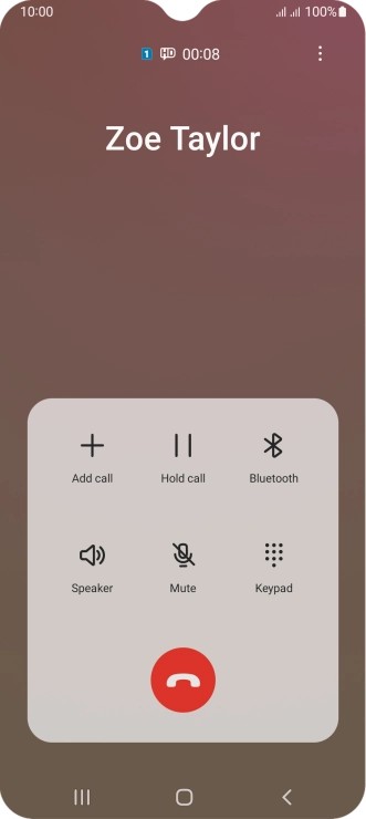 Press the end call icon.