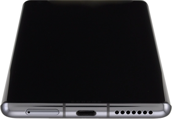 Find the opener for the card holder. Insert the opener into the small hole in the card holder.