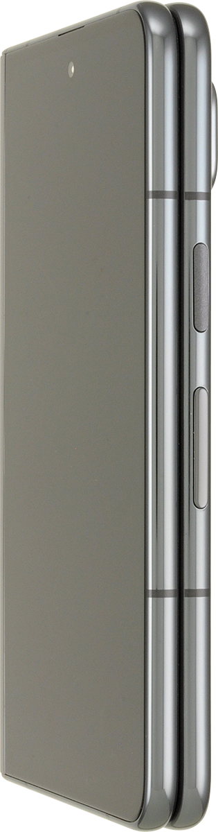 Press and hold the Side key until your phone is turned on.