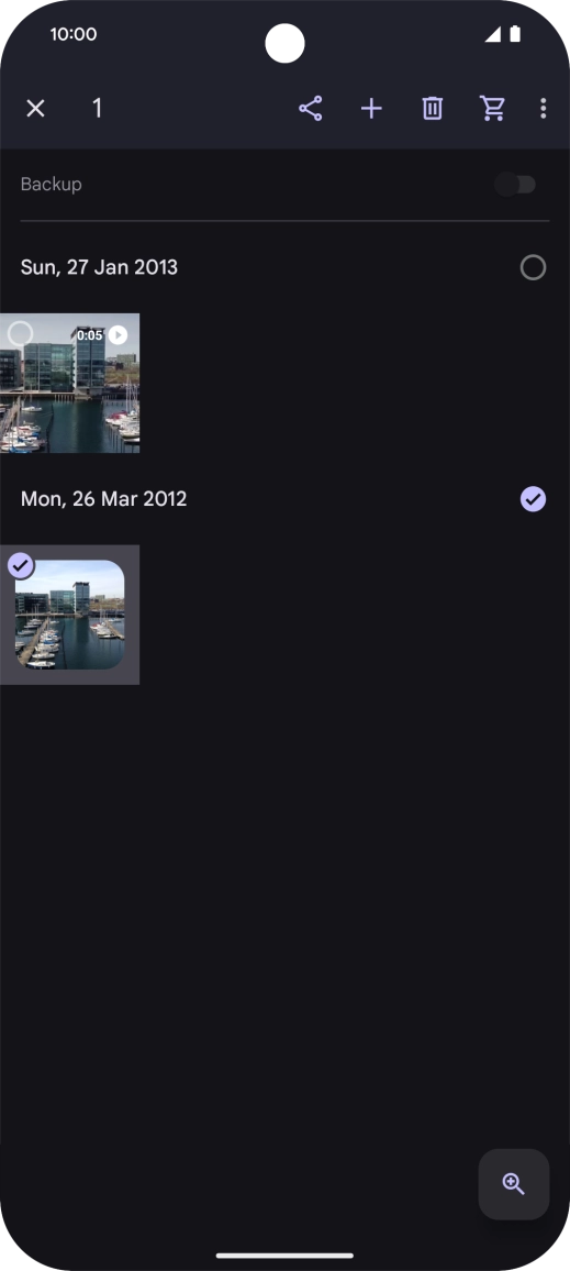 Press the required pictures or videos to select them.