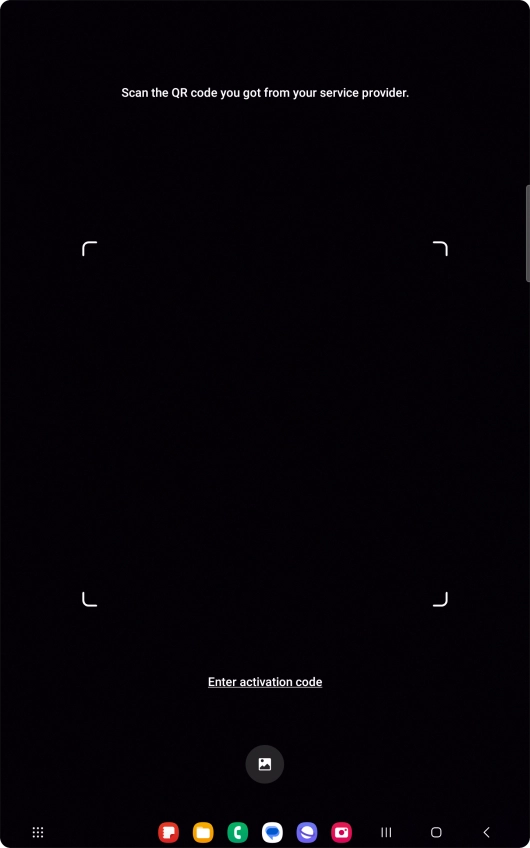 Place the QR code you've received inside the tablet camera frame to scan the code.