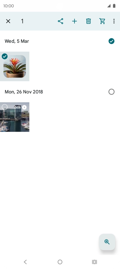 Press the required pictures or videos to select them.
