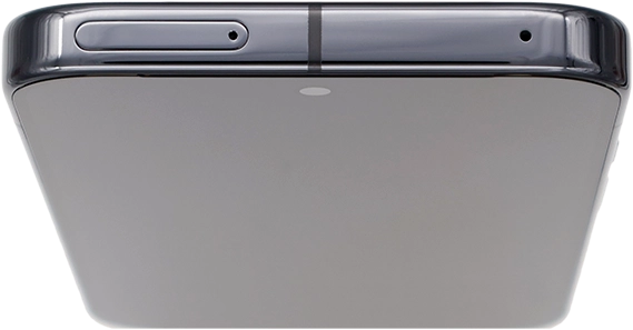 Insert the opener into the small hole in the SIM holder.