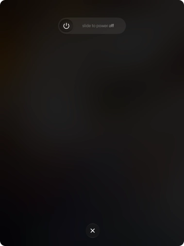 Press and drag the power off icon right.