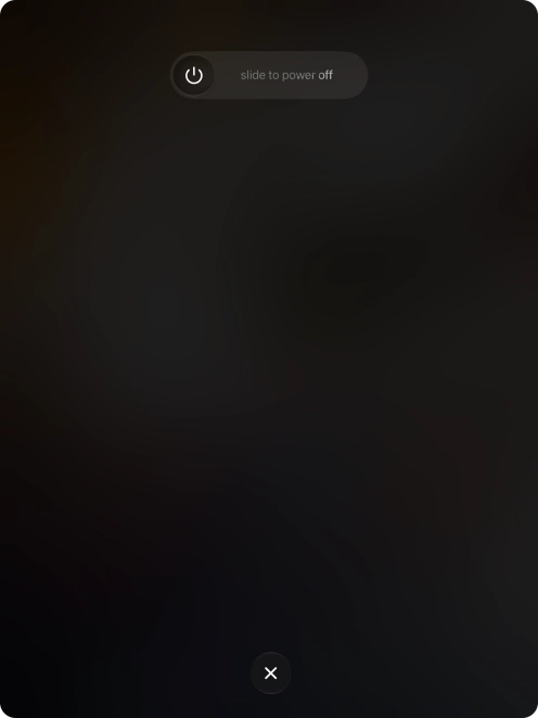Press and drag the power off icon right.