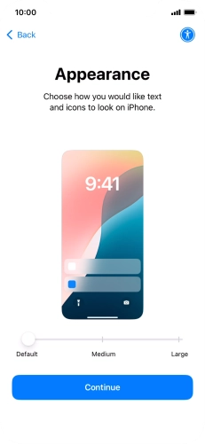 Select the required text and icon size on your phone and press Continue.