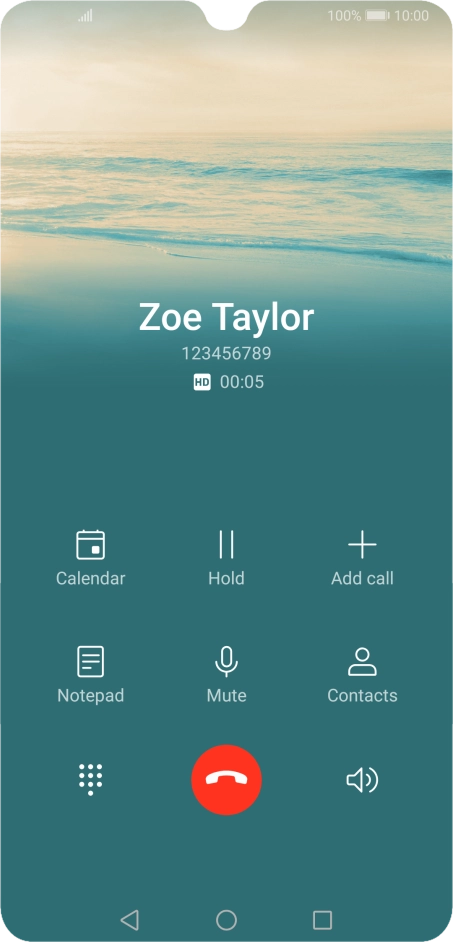 Press the end call icon.