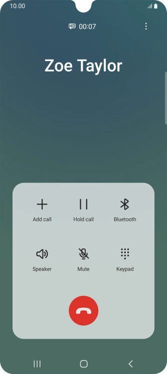 Press the end call icon.