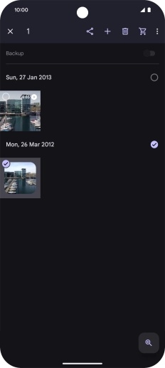 Press the required pictures or videos to select them.