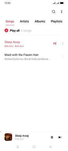 Press the song title at the bottom of the screen.