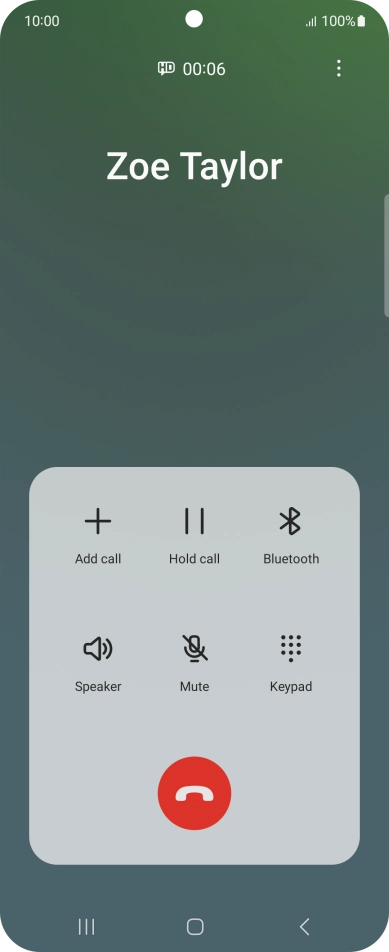 Press the end call icon.
