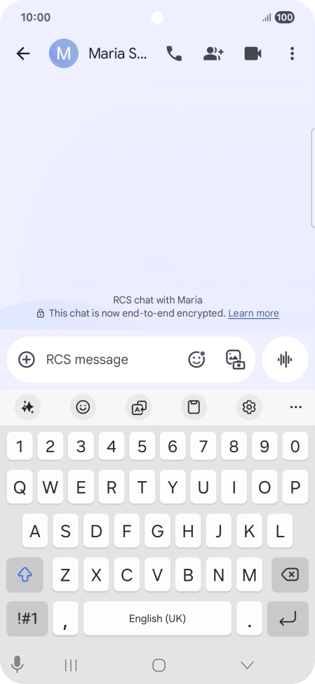 Select an existing conversation or create a new message and press the AI icon.