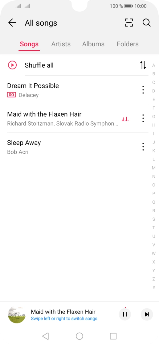 Press the song title at the bottom of the screen.