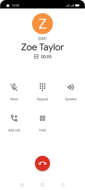 Press the end call icon.