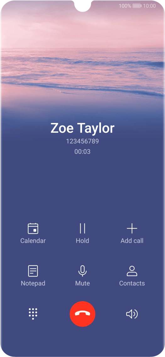 Press the end call icon.