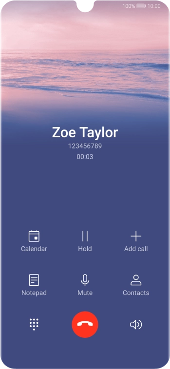 Press the end call icon.