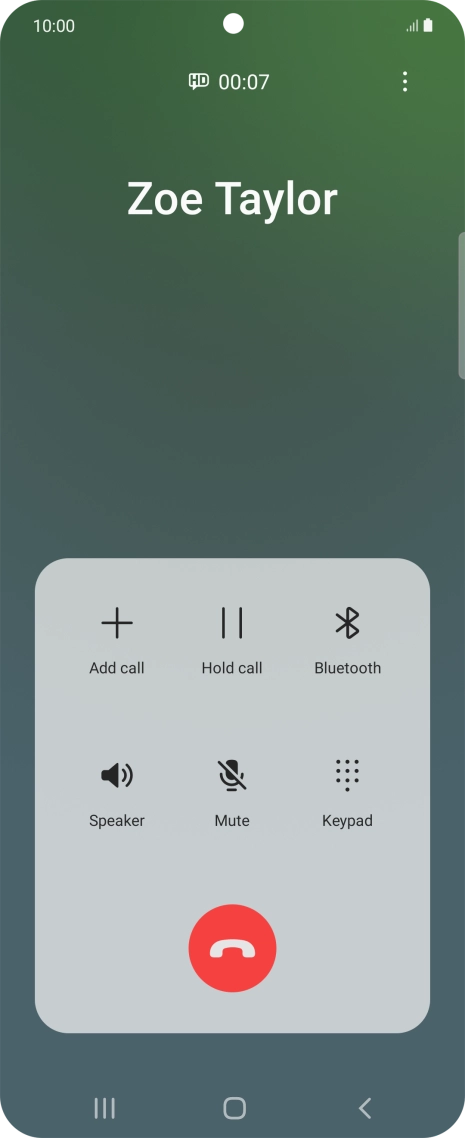 Press the end call icon.