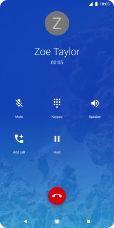 Press the end call icon.