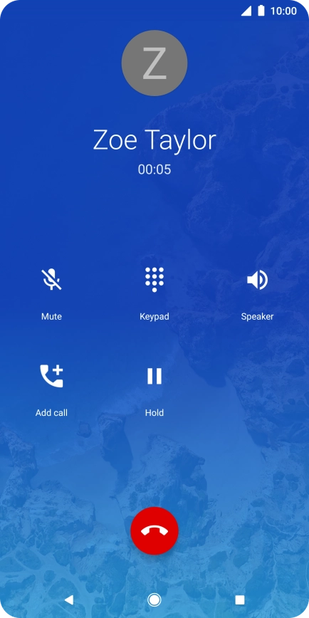 Press the end call icon.