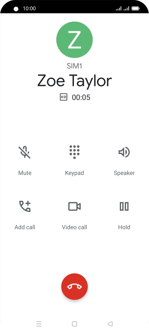 Press the end call icon.