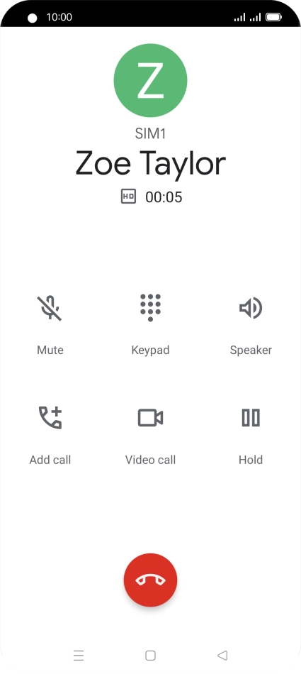 Press the end call icon.