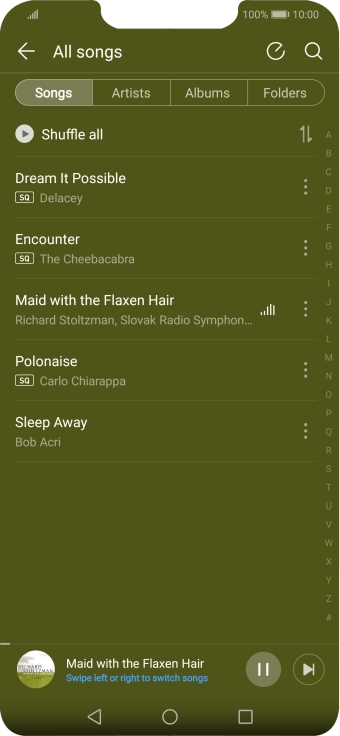 Press the song title at the bottom of the screen.