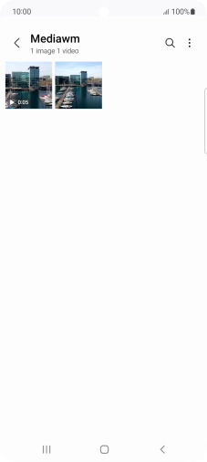 Press and hold any picture or video clip.