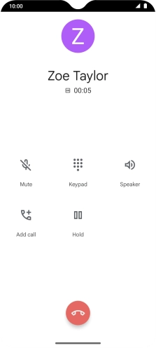 Press the end call icon.