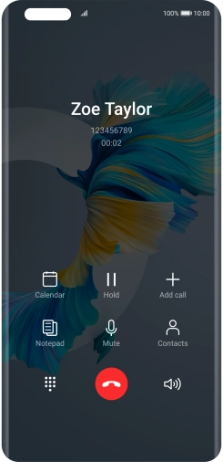 Press the end call icon.