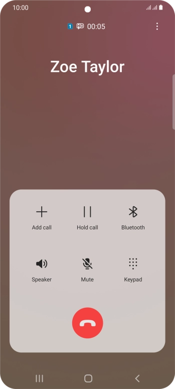 Press the end call icon.
