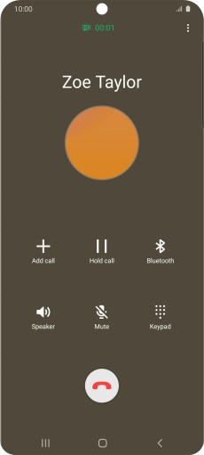 Press the end call icon.